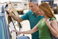 Photo: Couple shopping for car